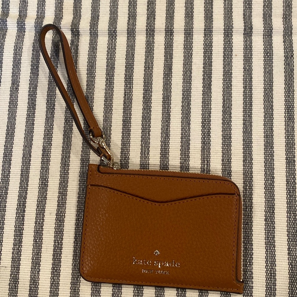 Kate Spade coin purse. Brand new caramel and color.